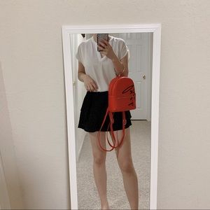 Backpack with handheld ring